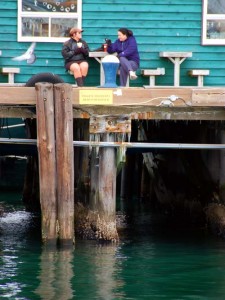 people having coffee on a wharf in Halifax